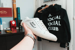 Fashion Forward With Anti Social Social Club Hoodie And Cool Sneakers Wallpaper