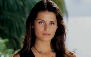 Fashion Icon Isabeli Fontana Radiating Elegance In A Chic Black Dress Wallpaper