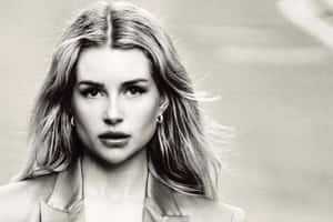 Fashion Icon Lottie Moss Standing In An Artistic Light Wallpaper