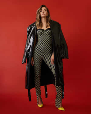 Fashion Modelin Checkered Jumpsuitand Glossy Coat Wallpaper