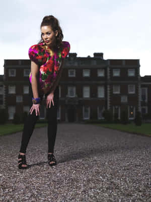 Fashionable Womanin Floral Top Outdoors Wallpaper