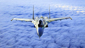 Fast And High-tech: A Jet Flying At High Speed Wallpaper