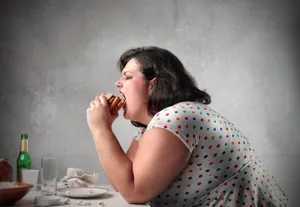 Fat Girl Wearing A Polka-dot Dress Wallpaper