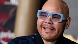 Fat Joe Smilingin Blue Shades Wallpaper