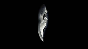 Fear Strikes Deep - The Infamous Ghostface From The Scream Series Wallpaper