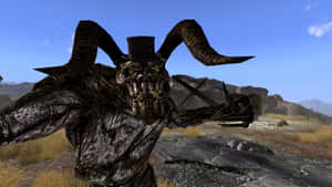 Fearsome Deathclaw In Post-apocalyptic Landscape Wallpaper