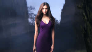 Feel Luxurious This Season In This Beautiful Rich Purple Dress Wallpaper