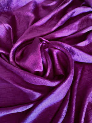 Feel Luxurious With This Bright And Beautiful Purple Satin Wallpaper. Wallpaper