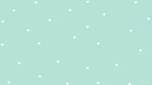 Feel The Love With These Bright, Mint Green Hearts Wallpaper