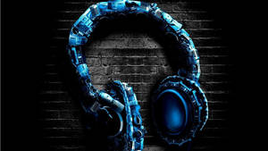 Feel The Music With These Blue Headphones Wallpaper