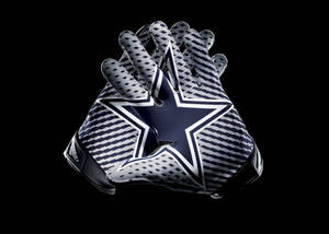 Feel The Power Of Dallas Cowboys In Your Hands Wallpaper