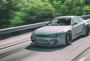 Feel The Power Of Nissan Silvia S15 On The Road Wallpaper