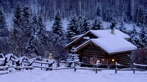 Feel The Warmth Of Winter And Enjoy A Cozy Night By The Fire. Wallpaper