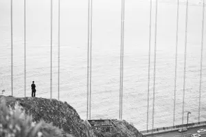 Feeling Alone Overlooking Water Wallpaper