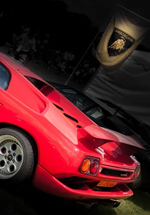 Feeling The Wind In Your Hair While Driving A Classic Ferrari Wallpaper