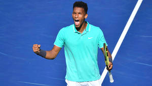 Felix Auger Aliassime Celebratory Fist Pump Wallpaper