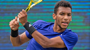 Felix Auger-aliassime Focused During The Game Wallpaper