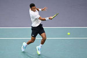 Felix Auger Aliassime Tip Toes Wallpaper