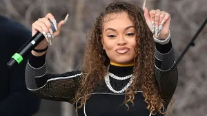 Female_ Artist_ Performing_ With_ Microphone Wallpaper