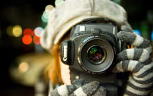 Female Photographer Holding Canon Photography Camera Wallpaper