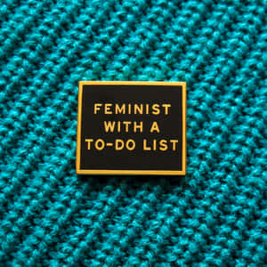 Feminist Enamel Pinon Teal Knit Background Wallpaper