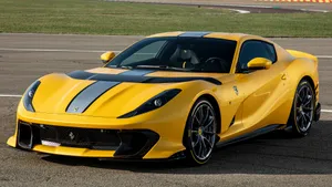 Ferrari 812 Superfast On A Scenic Road Wallpaper