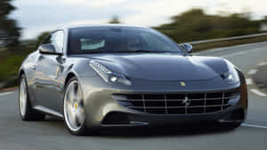 Ferrari Ff Luxury Sports Car On Scenic Road Wallpaper