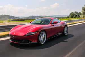 Ferrari Roma Cruising On An Open Road Wallpaper