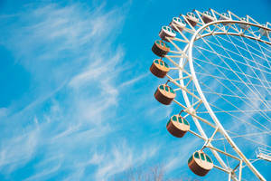 Ferris Wheel And Blue Sky Wallpaper