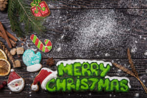 Festive Christmas Cookieson Wooden Background Wallpaper