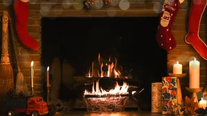 Festive Christmas Fireplace Decor Wallpaper