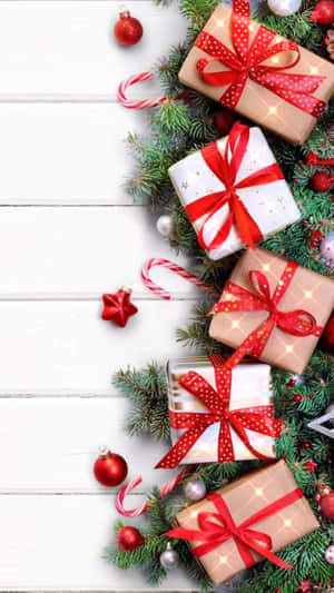 Festive Christmas Giftsand Decorations Wallpaper