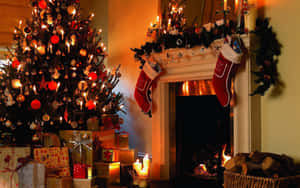 Festive Christmas Treeand Fireplace Decor Wallpaper