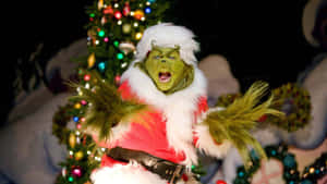 Festive Grinch Caughtin Action Wallpaper