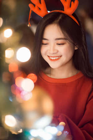 Festive Reindeer Antlers Girl Smile Wallpaper