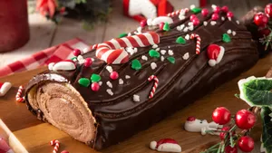 Festive Yule Log Cake Wallpaper