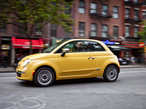 Fiat 500 In A Scenic Landscape Wallpaper
