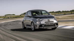 Fiat 500: The Perfect Blend Of Style And Performance Wallpaper