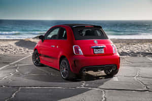 Fiat 500l On Clear Urban Street Wallpaper