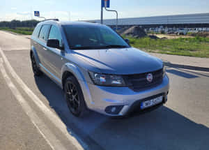 Fiat Freemont Parked Beside Road Wallpaper