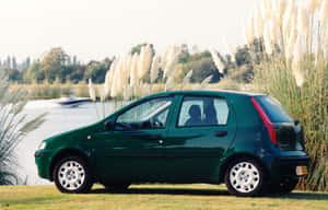 Fiat Grande Punto In Striking Red Wallpaper