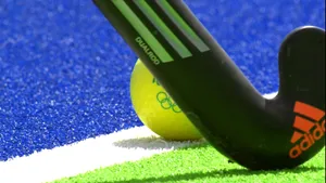 Field Hockey Stick And Ball Wallpaper