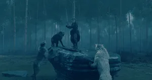 Fierce Wolf Mid-attack In A Forest Wallpaper