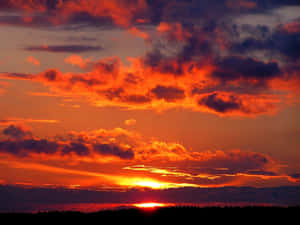 Fiery Orange Sunset Sky Wallpaper