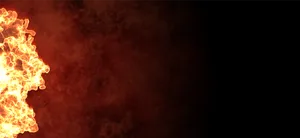 Fiery Profile Against Dark Backdrop Wallpaper