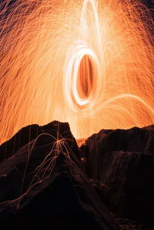 Fiery_ Spinning_ Steel_ Wool_ Long_ Exposure Wallpaper