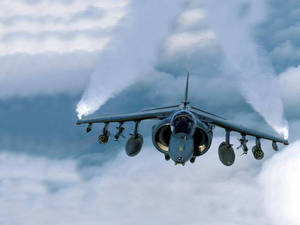 Fighter Jet Demonstrating Aerial Mastery Wallpaper