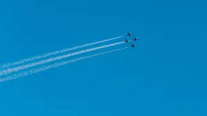 Fighter Jets Fly In Clear Blue Plain Wallpaper