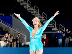 Figure Skater Celebrationon Ice Wallpaper