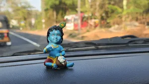 Figurine Of Baby Krishna 4k Wallpaper